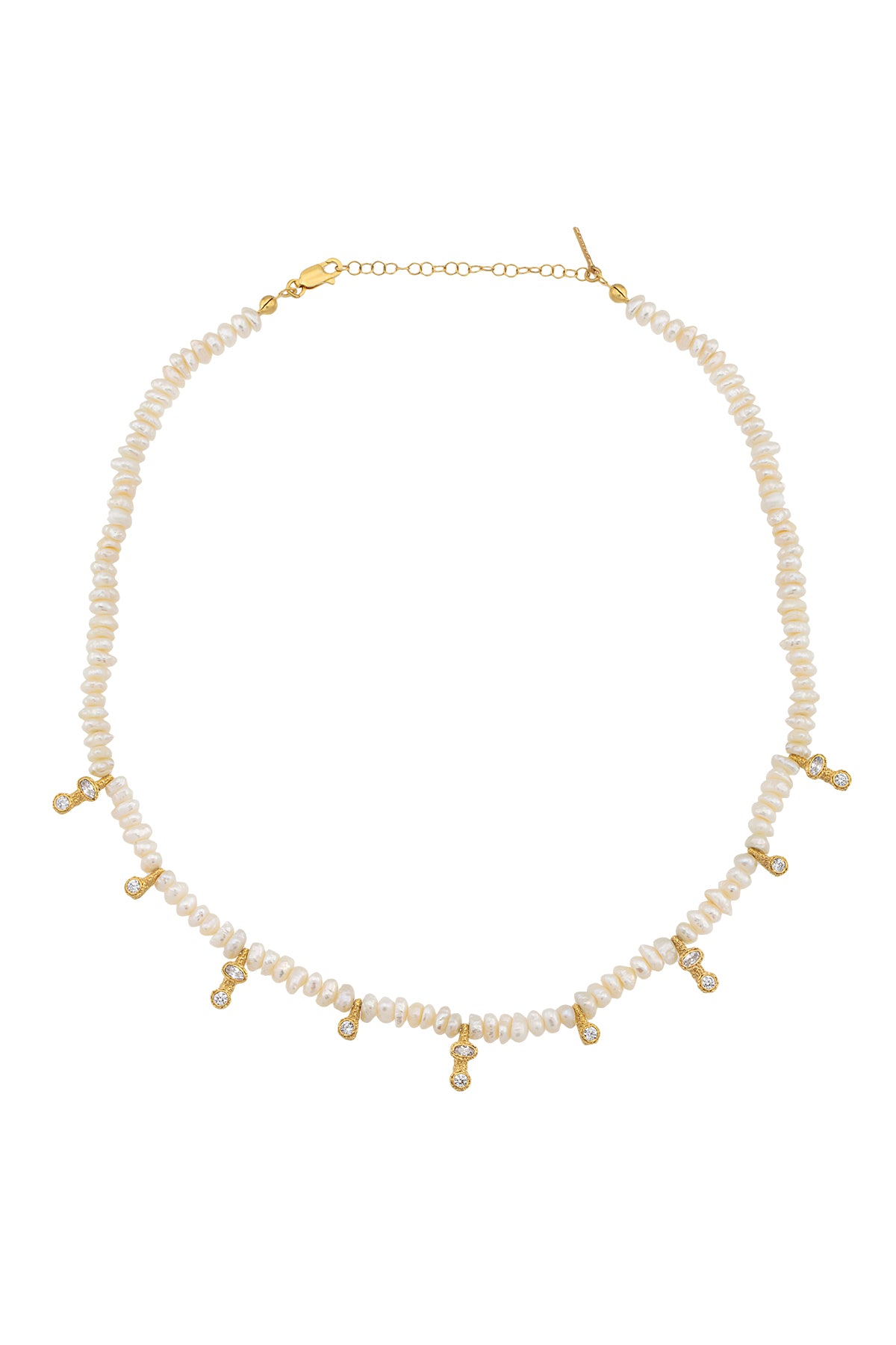 A gold-plated necklace with baroque pearl necklaces and small gold-tone pendants.