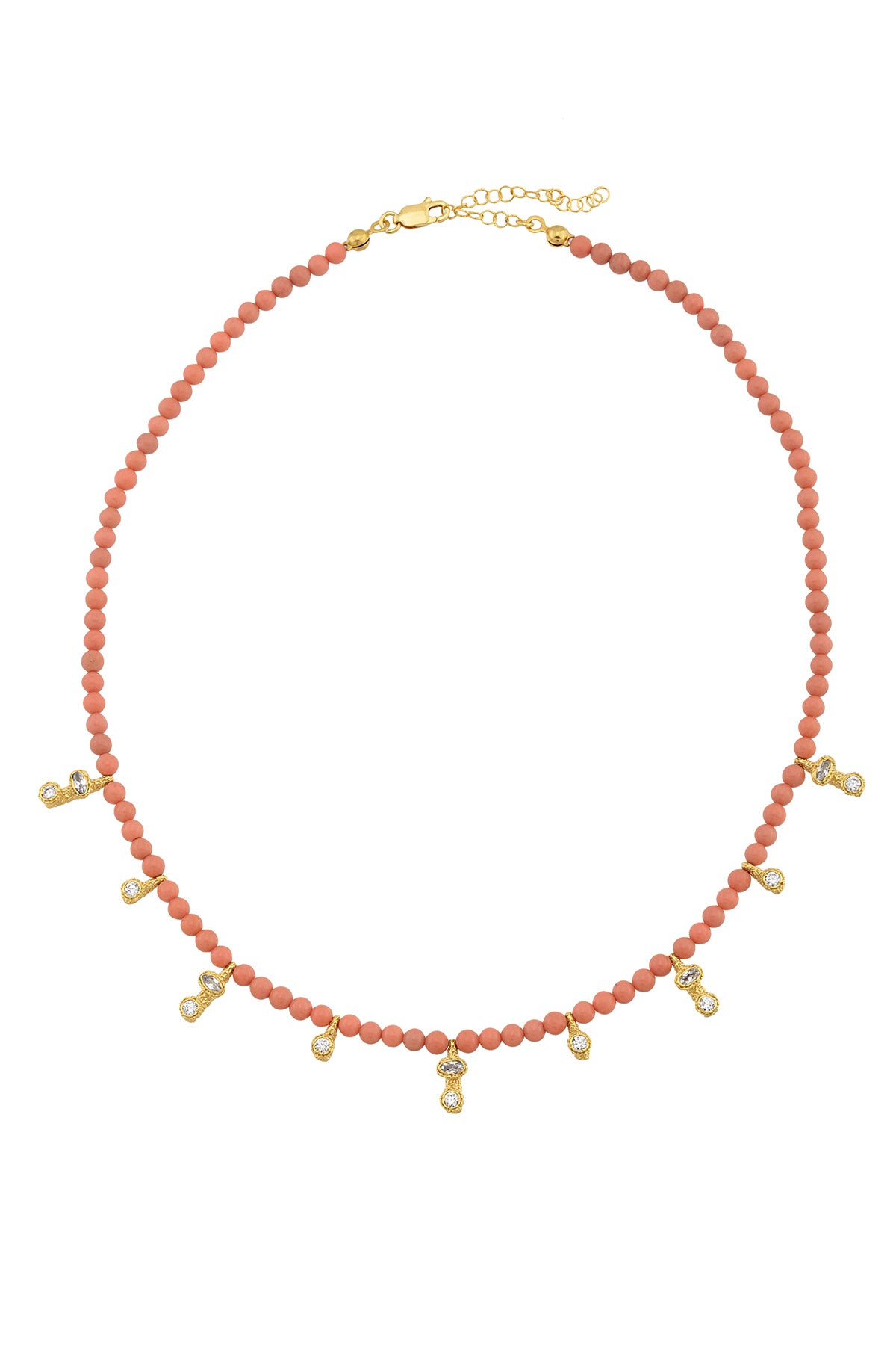 A gold-plated necklace with rose quartz stones and small gold charms, displayed against a white background.