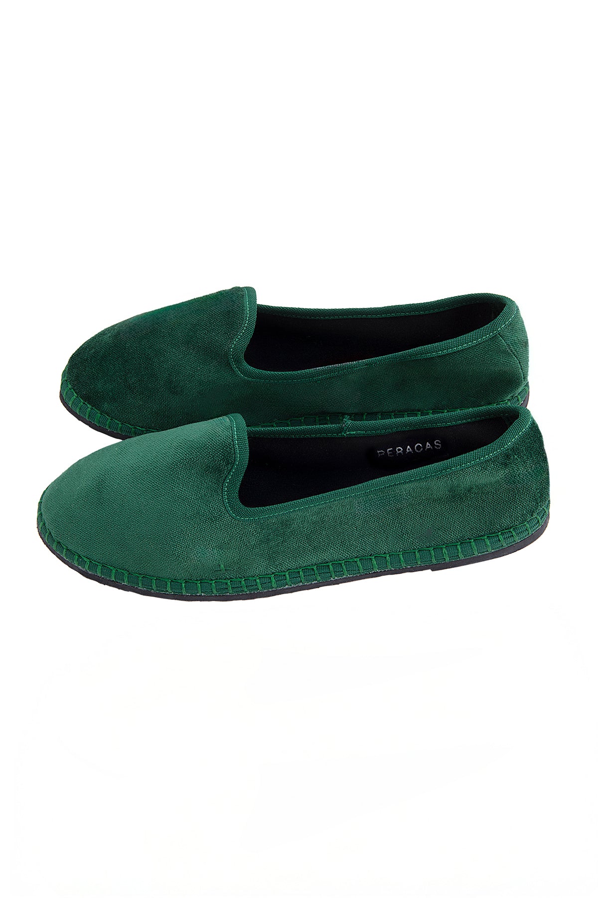 Green slippers on a white background