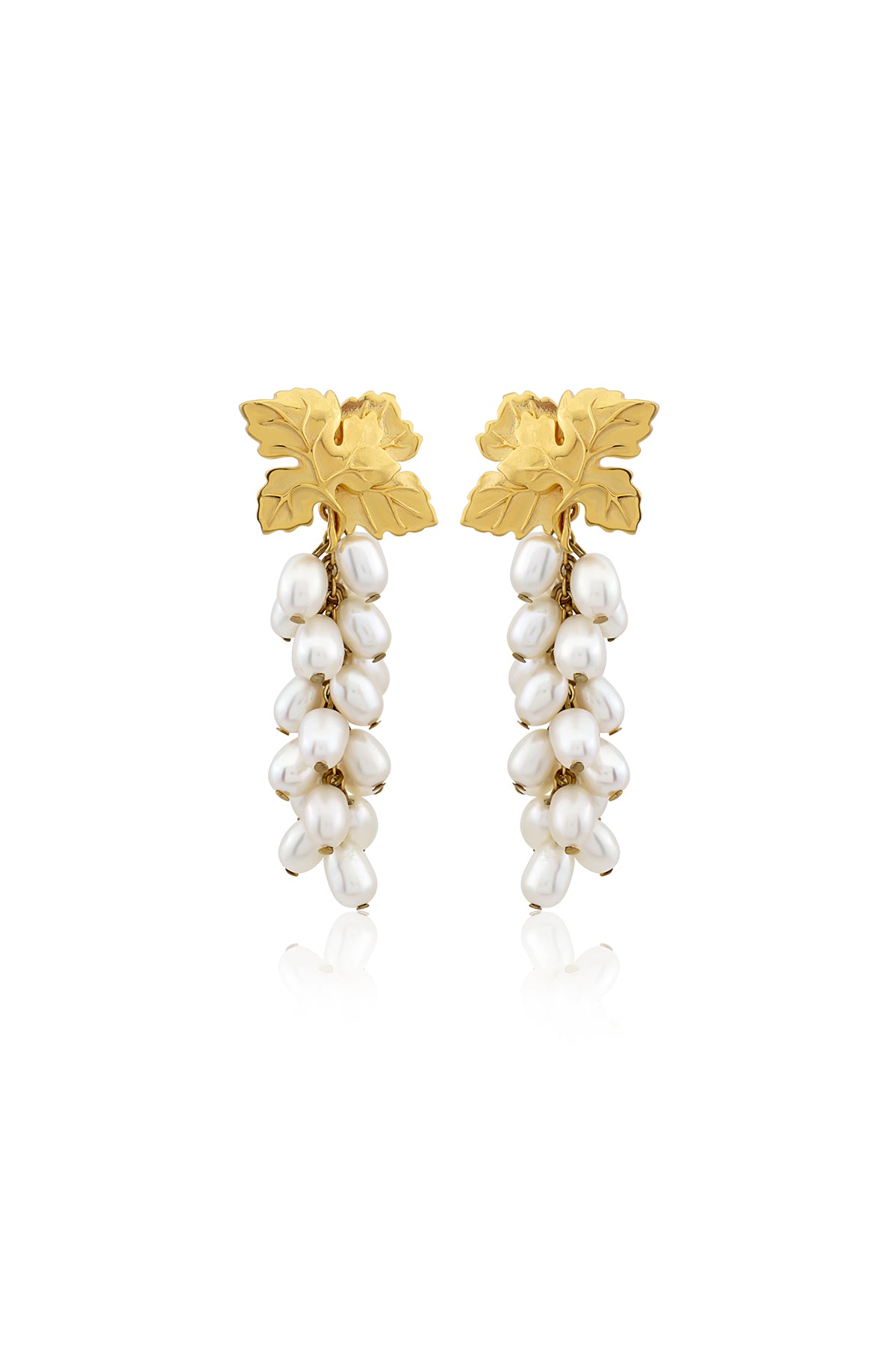 A pair of gold-plated earrings with baroque pearls, featuring a floral design at the top and a series of pearl drops.